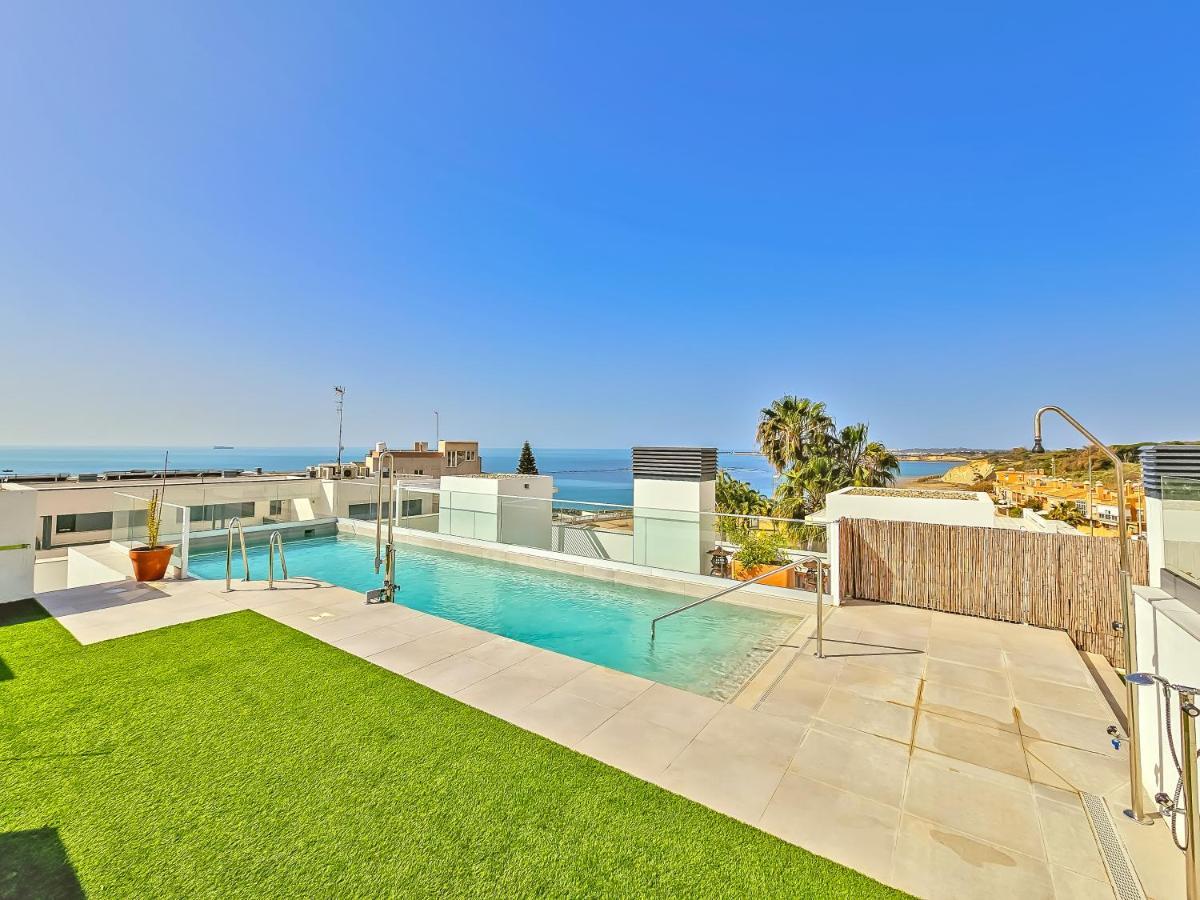 Oceanfront Duplex With A Rooftop Pool And Terrace El Puerto de Santa Maria Exterior photo